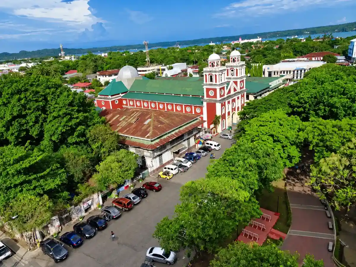 Aerial view of a historic church and plaza in Iloilo